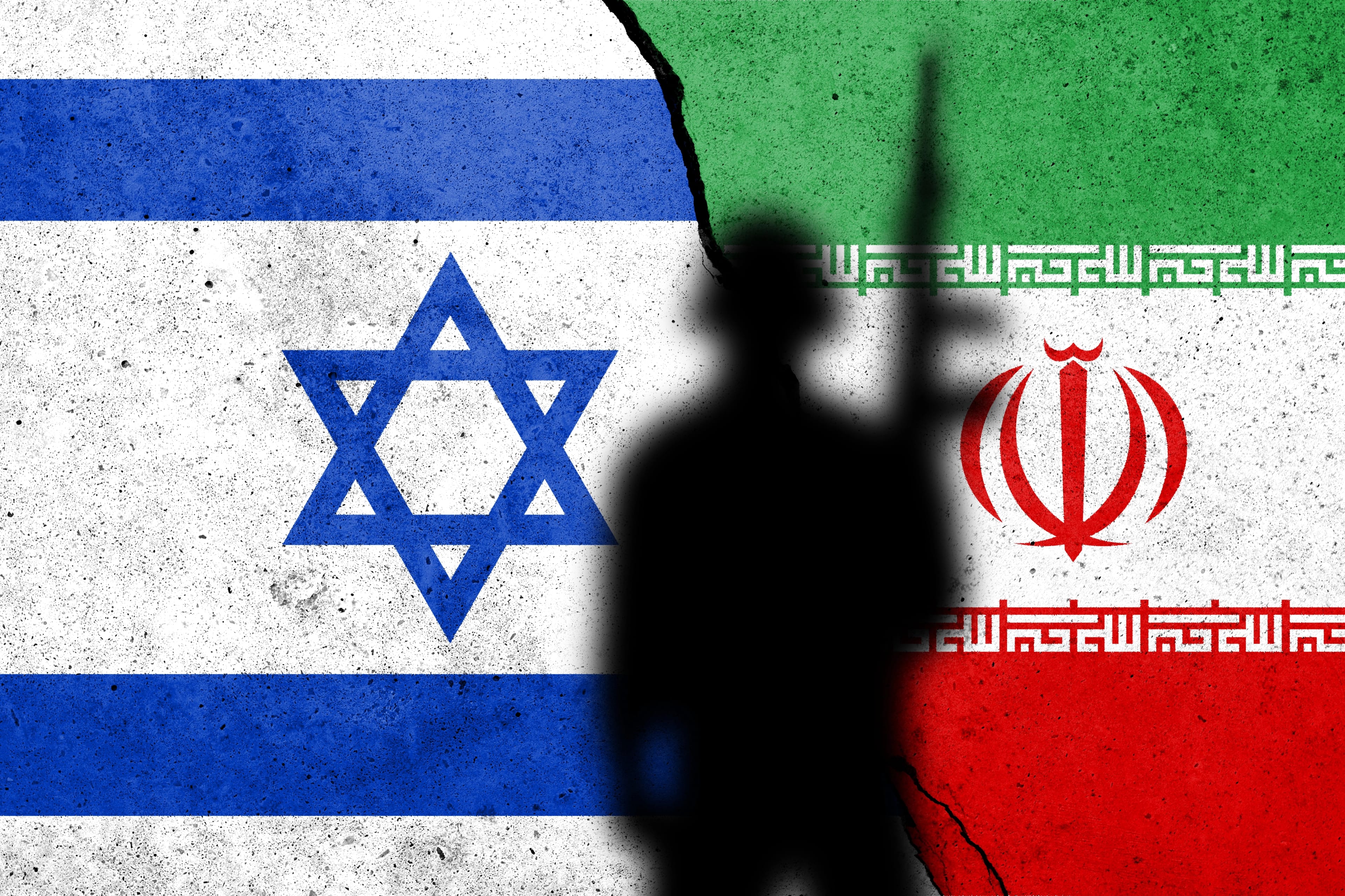 Flags,Of,Israel,And,Iran,Painted,On,The,Concrete,Wall