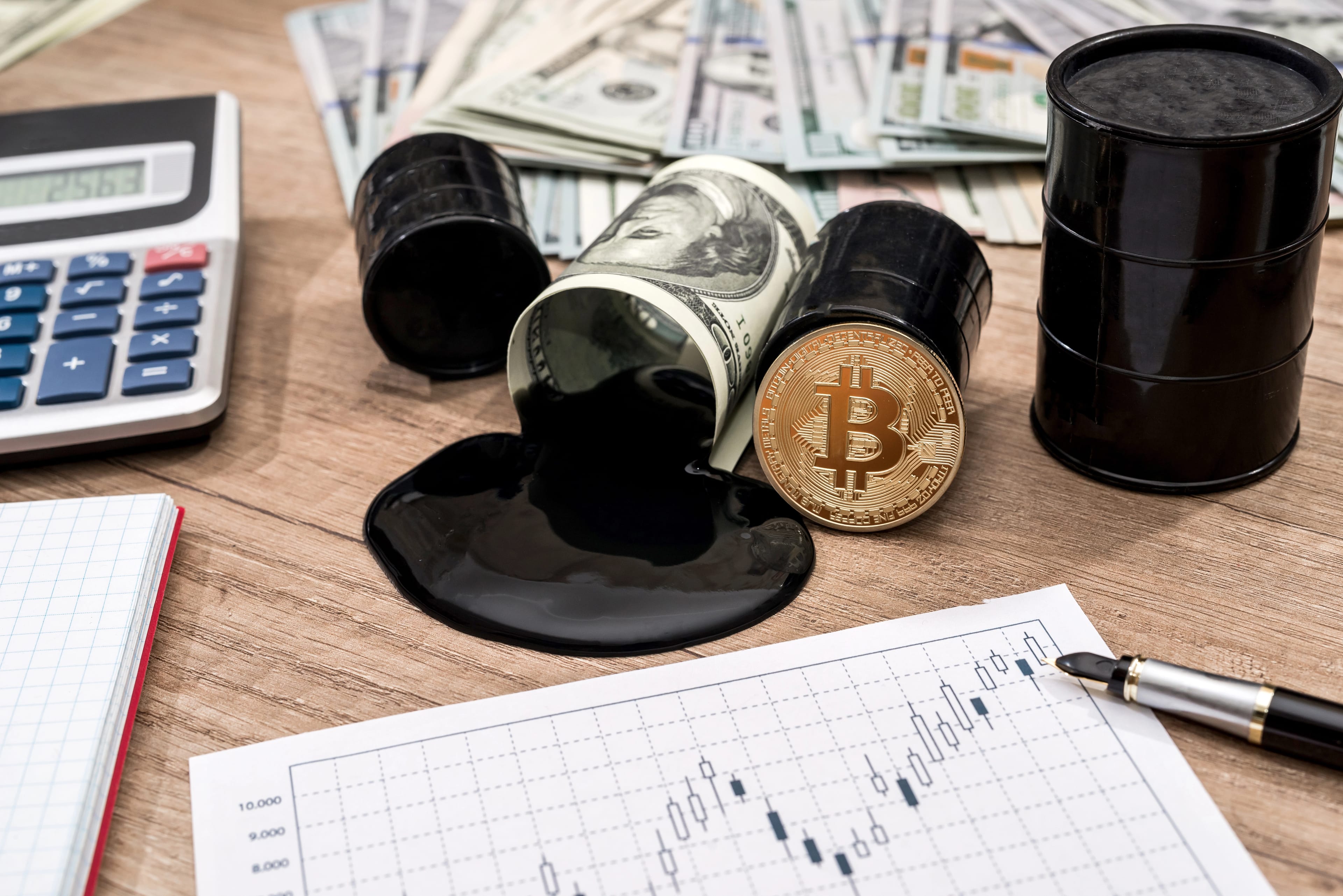 Barrel,Of,Oli,,Dollar,,Bitcoin,,Calculator,And,Pen