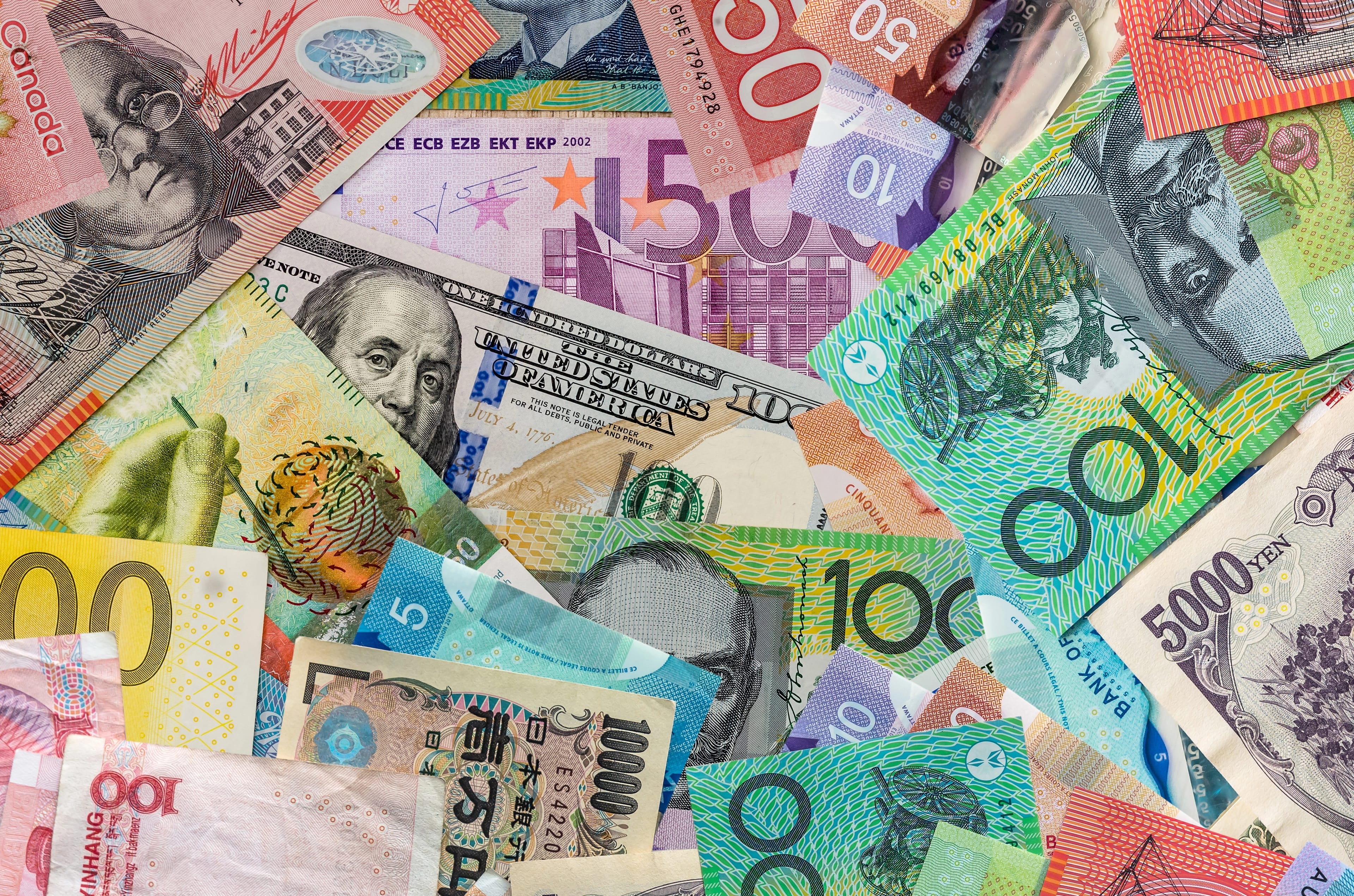 Currencies,Banknotes,As,Finance,Background,,Exchange,World,Money,,Investment,Concept