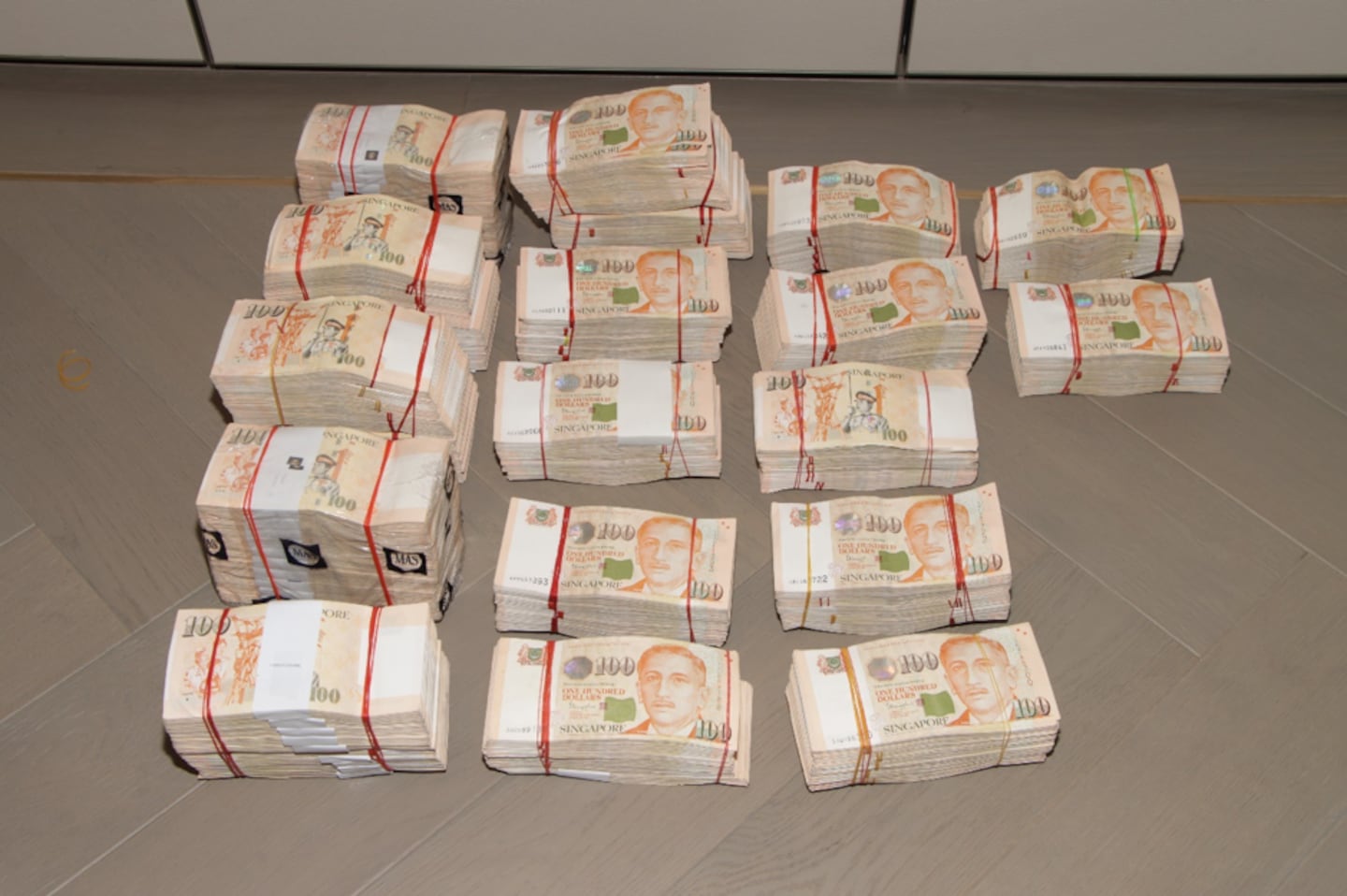 Cash seized by Singaporean police in August last year.